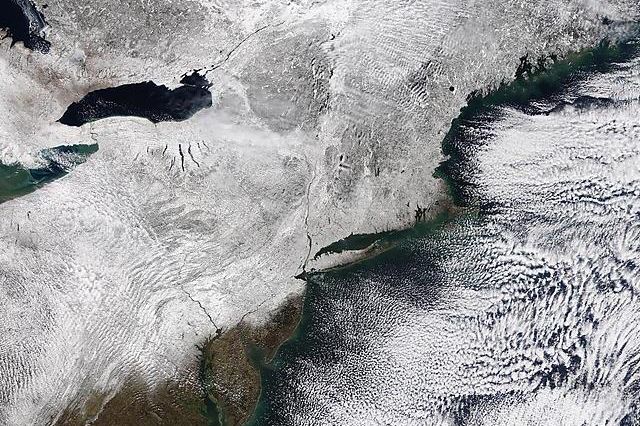 Satellite view of a snow-covered New York State